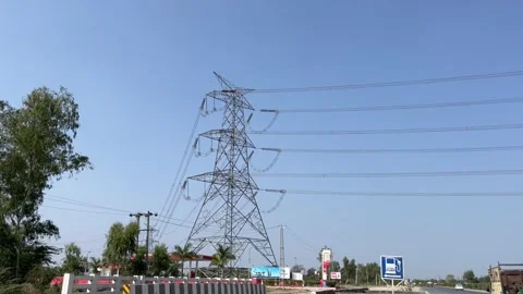 High Voltage Power Transmission Tower with Electric Lines Видео 329854968