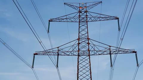 High voltage pylon on a background of blue sky Stock Photos