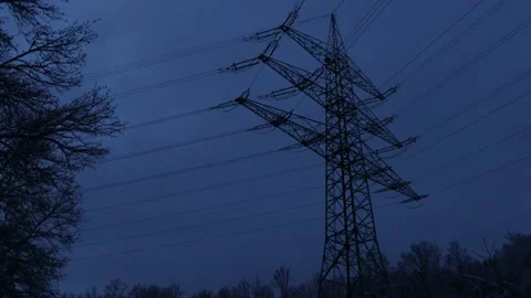 A high voltage pylon filmed in the evening Stock Footage 167638516