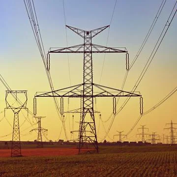 High voltage pylons. Concept for technology and industry. Rising energy price Stock Photos