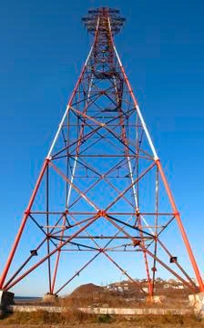 High-voltage rack or high-voltage tower. Stock Photos