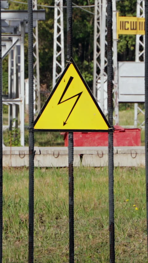 High Voltage Sign On Electrical Substation Fence. Vertical. Stock Footage 289628664