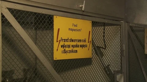 High voltage sign on a gate Stock Footage 69847589