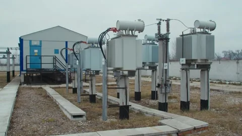 High voltage substation 110 kV tall pylons and hog voltage distribution cables Stock Footage 130776800