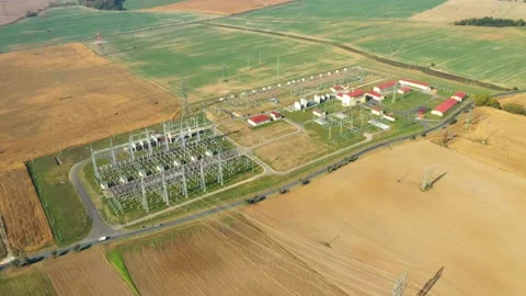 High voltage substation in green fields. Stock Footage 164873110