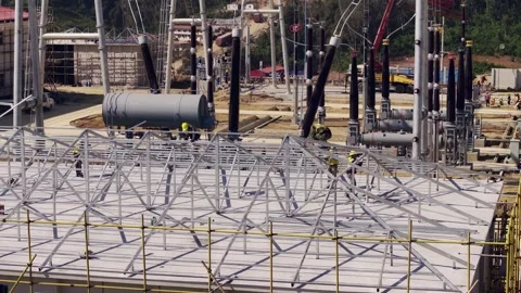 High Voltage Substation Under Construction with Solar Panels on Hillside Vídeos de archivo 344440390
