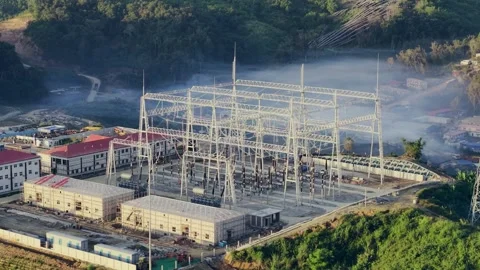 High Voltage Substation Under Construction with Solar Panels on Hillside Video stock 344443755