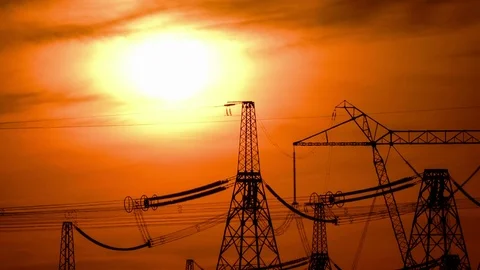 A high voltage substations, in the sunset. Transmission power lines. Timelapse Stock Footage 74334209