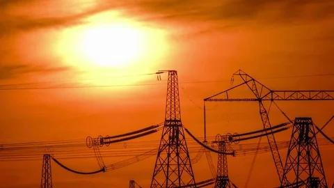 A high voltage substations, in the sunset. Transmission power lines. Timelapse Stock Footage 74340614
