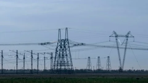 A high voltage substations, in the sunset. Transmission power lines. Heat haze Vídeo Stock 75629256