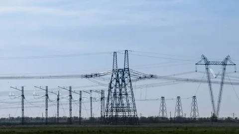 A high voltage substations, in the sunset. Transmission power lines. Heat haze Stock Footage 75630052