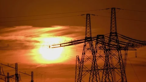 A high voltage substations, in the sunset. Transmission power lines. Timelapse 스톡 동영상 75632495