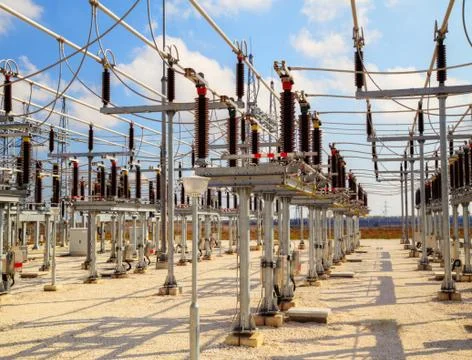 High voltage switchyard in electrical substation Stock Photos