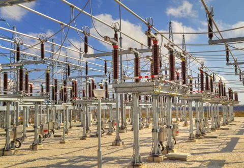High voltage switchyard in electrical substation Stock Photos