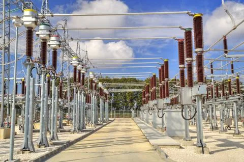 High voltage switchyard in electrical substation Stock Photos