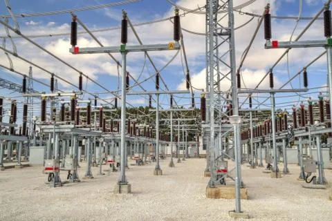 High voltage switchyard in electrical substation Stock Photos