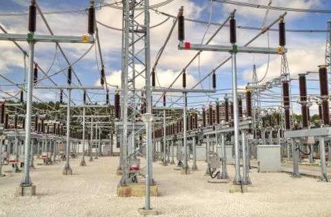 High voltage switchyard in electrical substation Stock Photos