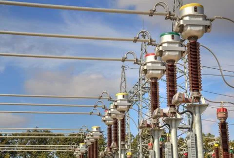 High voltage switchyard in electrical substation Stock Photos