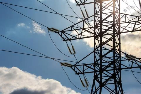 High voltage tower with electrical voltage wires isolates close-up against .. Stock Photos