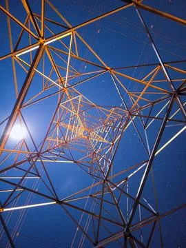 High voltage tower in long exposure night photography Stock Photos