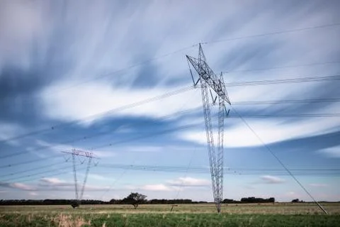 High voltage tower with moving clouds-13 Stock Photos