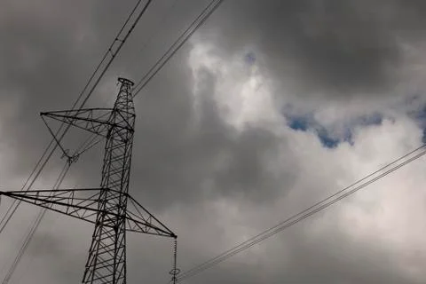 High-voltage tower sky background. Stock Photos