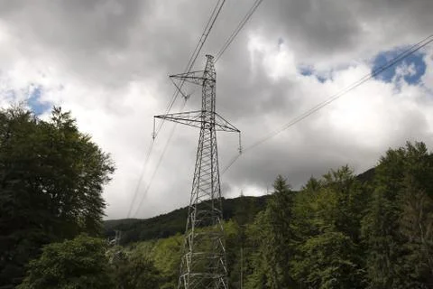 High-voltage tower sky background. Stock Photos