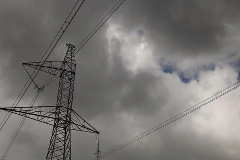 High-voltage tower sky background. Stock Photos