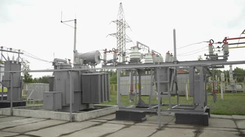High voltage transformer at the hydroelectric dam.Large power generation systems Stock Footage 117069976