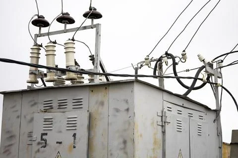 High voltage transformers, electricity facility. Stock Photos