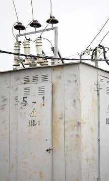 High voltage transformers, electricity facility. Stock Photos