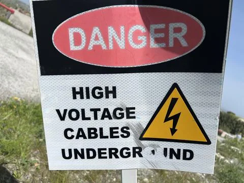 High Voltage Warning Sign At Work Site Stock Photos