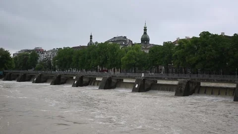 High water of Isar river in central Munich (Hochwasser) Mullersches Volksbad Stock Footage 134983366