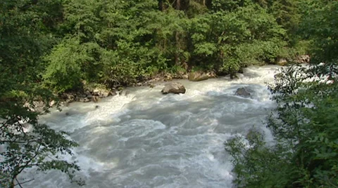 High water level in alpine river - high angle Stock Footage 34457558