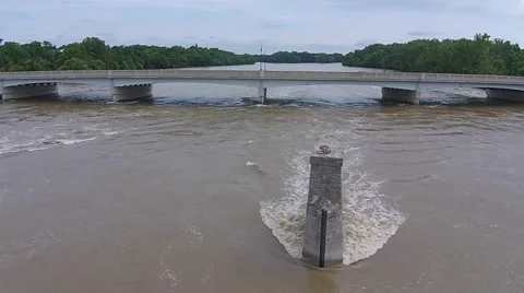 High water moving under bridge Stock-Footage 53029139