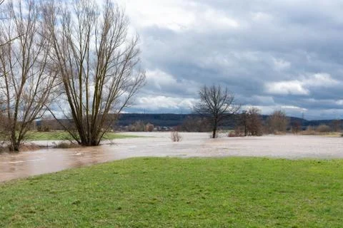 High water of a small river on the fields in spring Stock Photos