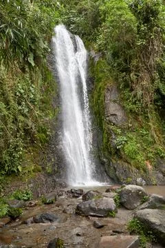 High waterfall base full of rocks Stock Photos