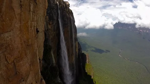 High Waterfall From Steep Mountain 4 [Slow Motion] Stock Footage 88533625
