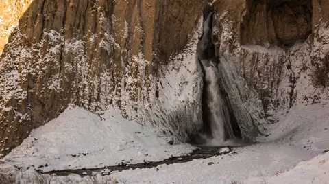 High waterfall in the tract Gil-Su high in the Caucasus mountains in winter Video stock 68907654