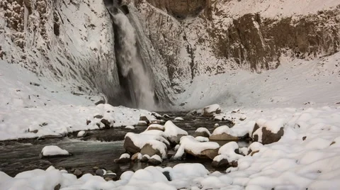 High waterfall in the tract Gil-Su high in the Caucasus mountains in winter Video stock 68908411