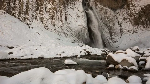 High waterfall in the tract Gil-Su high in the Caucasus mountains in winter Video stock 68908893