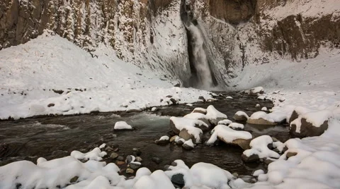 High waterfall in the tract Gil-Su high in the Caucasus mountains in winter Video stock 68909016