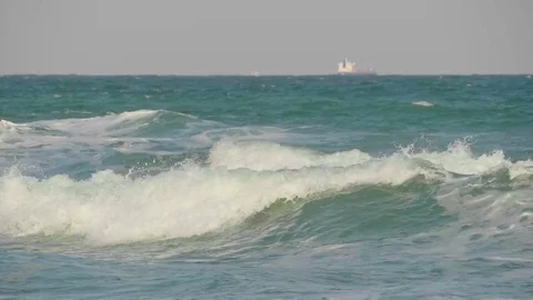 High waves against the background of ships. Stock Footage 80845235