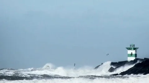 High waves at the harbor pier Stock Footage 84327480