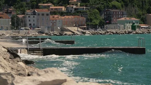 High waves hitting the shore. HIgh definition video Stock Footage 79580350