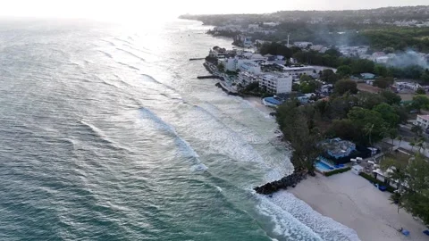 High wide drone panorama tracking the dramatic rocky coastline and sandy bays Video stock 336695745