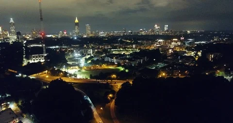 High Wide to low on the ground night drone shot Stock Footage 92551633