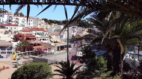 High wide shot, the main square in Carvoeiro, Portugal Stock Footage 64810083