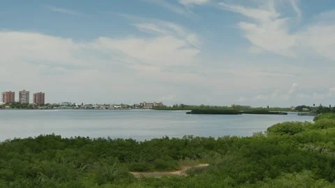 High Wide view from observation tower towards Boca Ciega Bay. Speedboat moves le Stock Footage 284359222