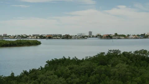 High Wide view from observation tower towards Boca Ciega Bay. Speedboat moves le Stock Footage 284359280